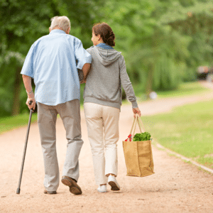 older gentleman with carer